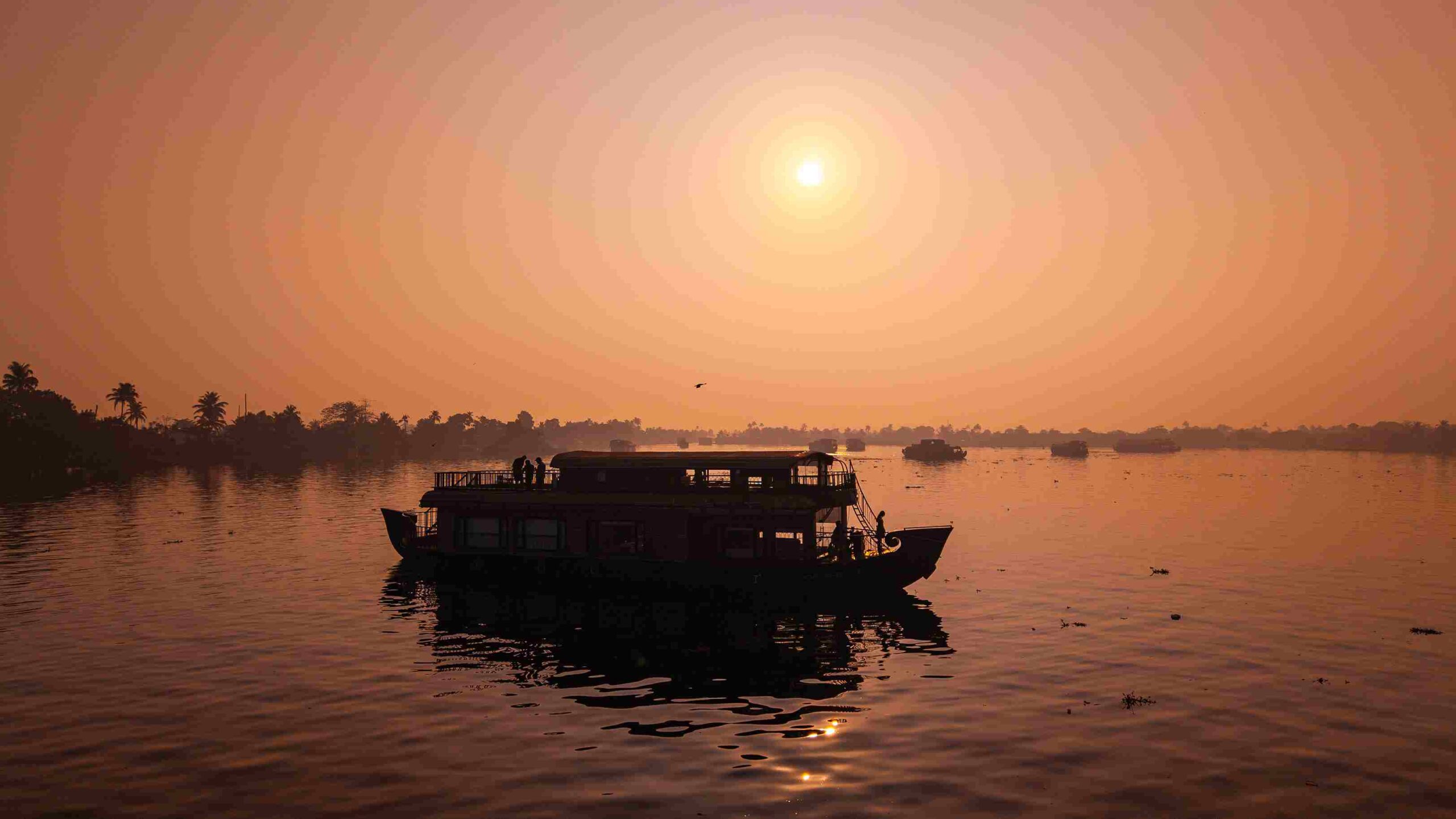 Golden sunset views across calm waters